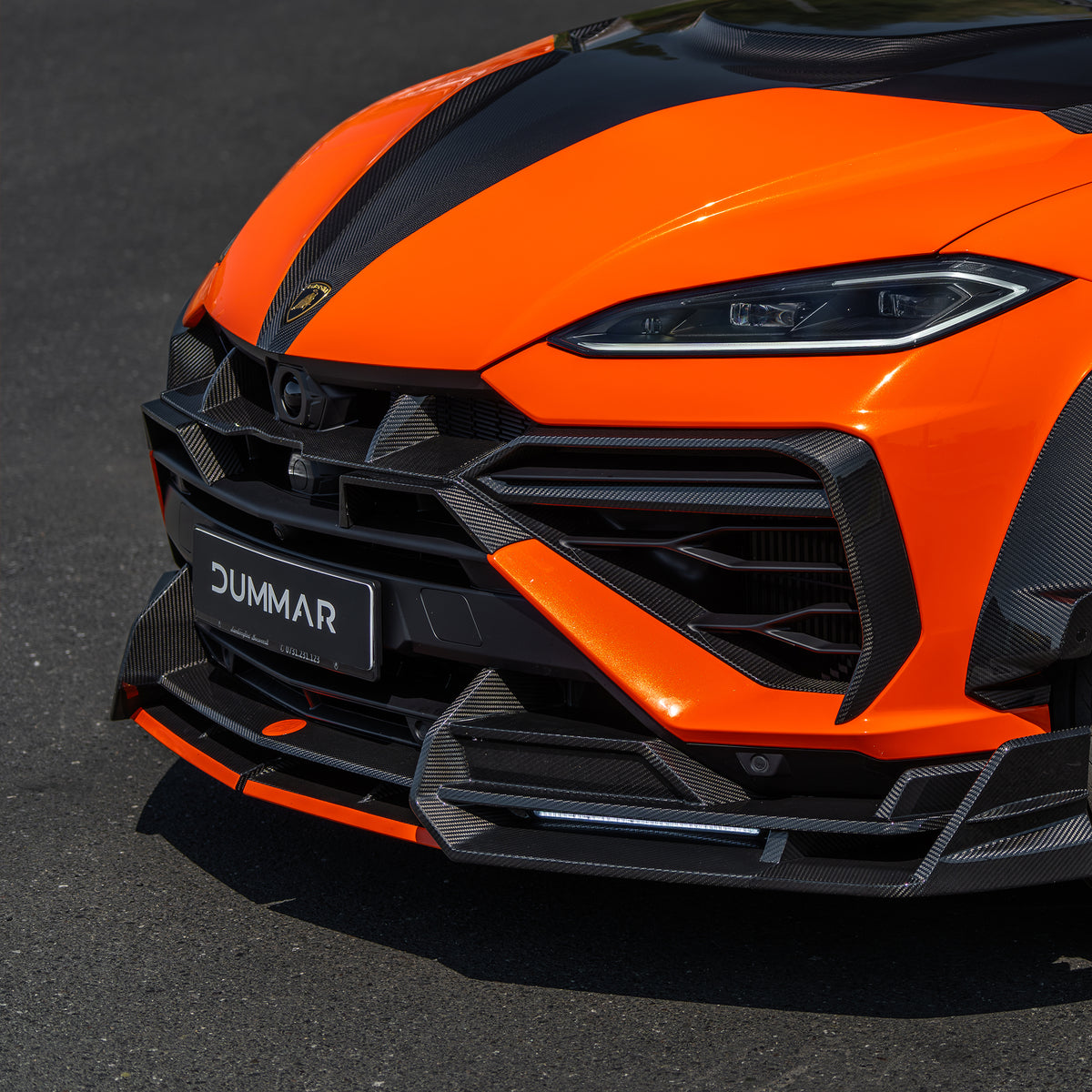 DUMMAR Urus SE carbon fibre front bumper extension, installed close-up