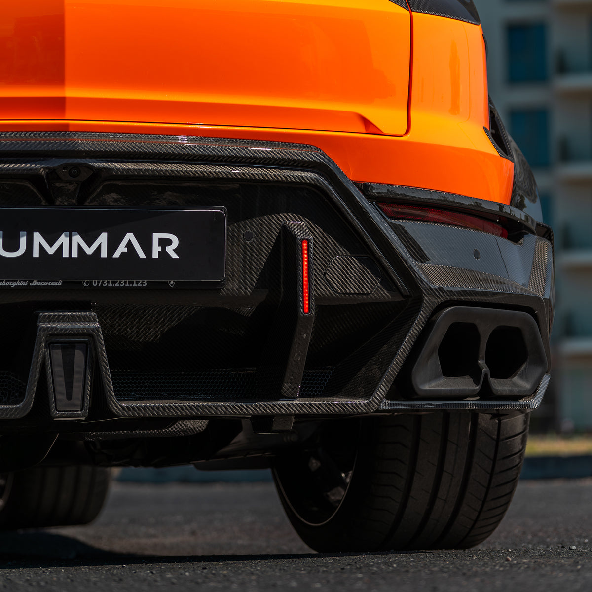 DUMMAR Urus SE rear diffuser, LED brake lights and aluminium exhaust tip, installed detail