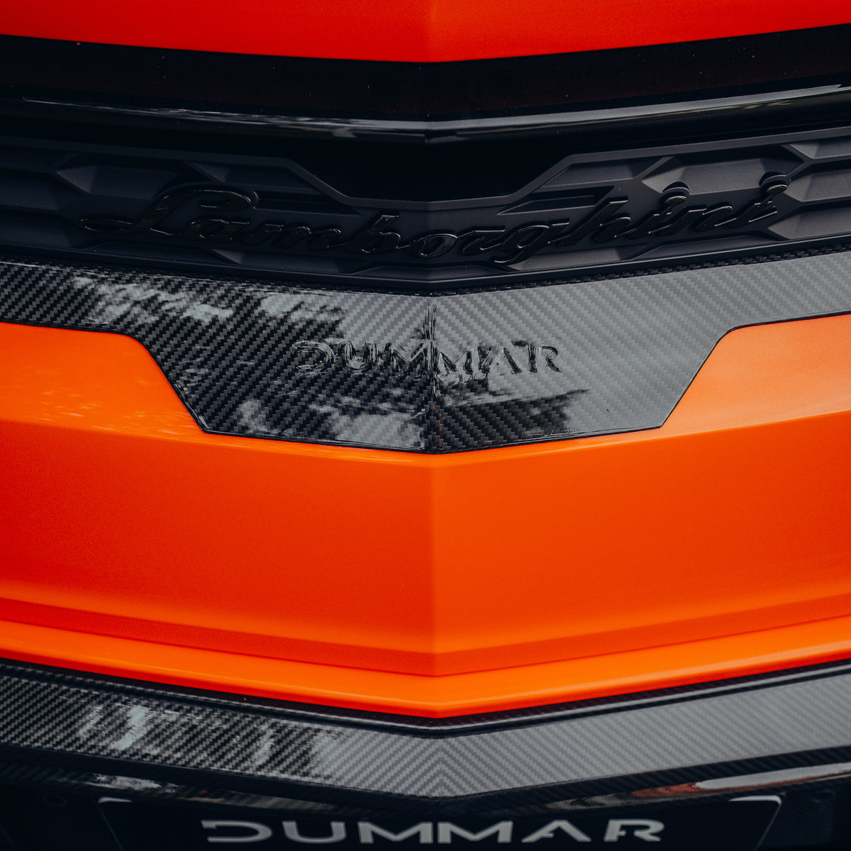 Embossed DUMMAR wordmark on the central rear trim of the Lamborghini Urus SE